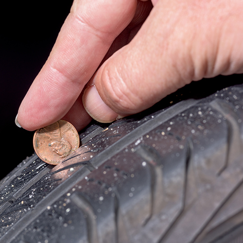 The penny test performed on a tire to check its tire tread depth