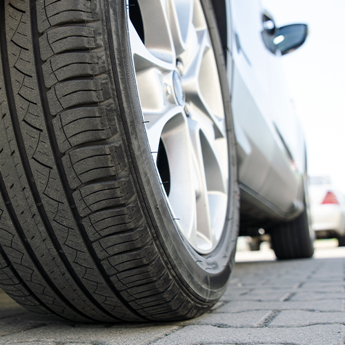 Street tire on a passenger vehicle